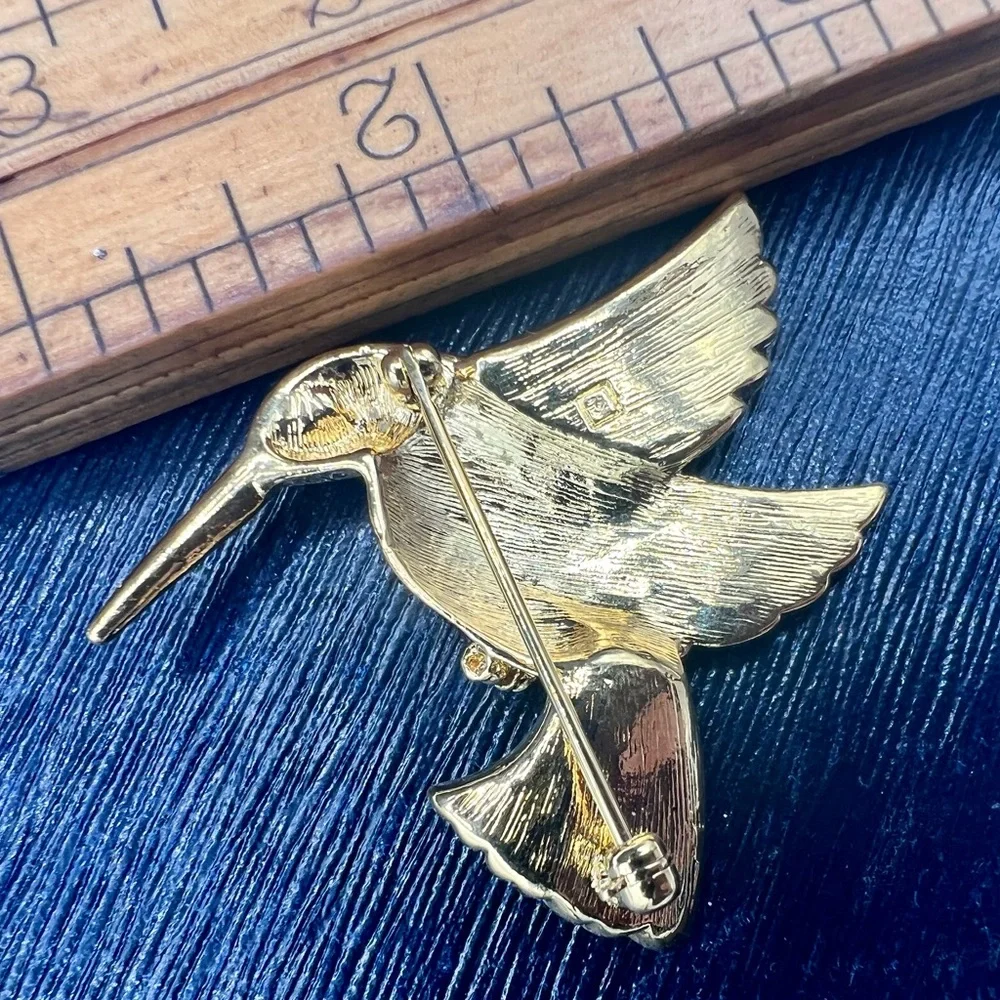 Vintage gold tone hummingbird brooch pin rhinestone eye